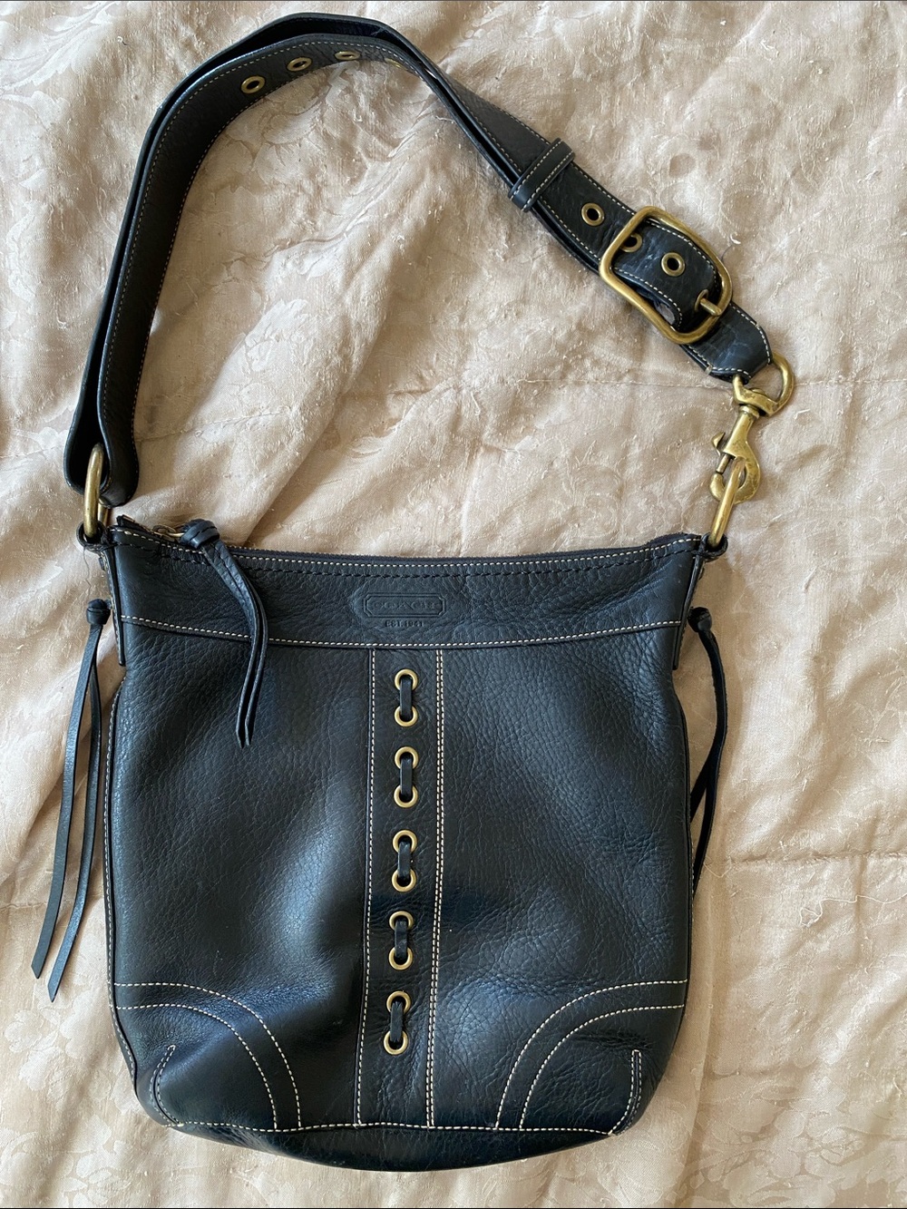 Coach Black Leather Shoulder Bag with Brass Grommet Accents